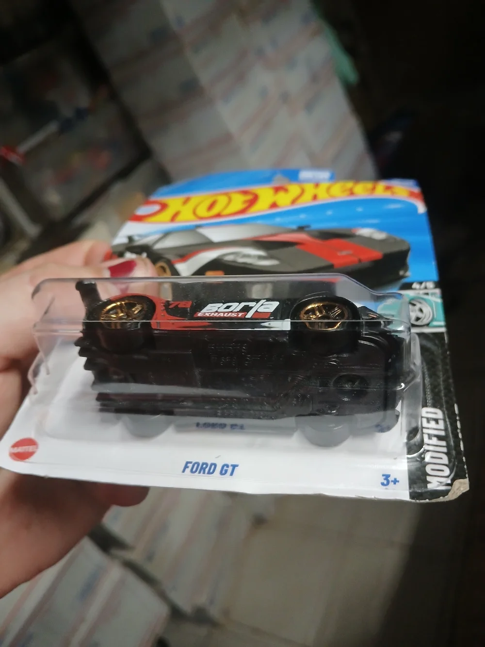 the Hot Wheels Ford GT (159/250) in black with red and white accents